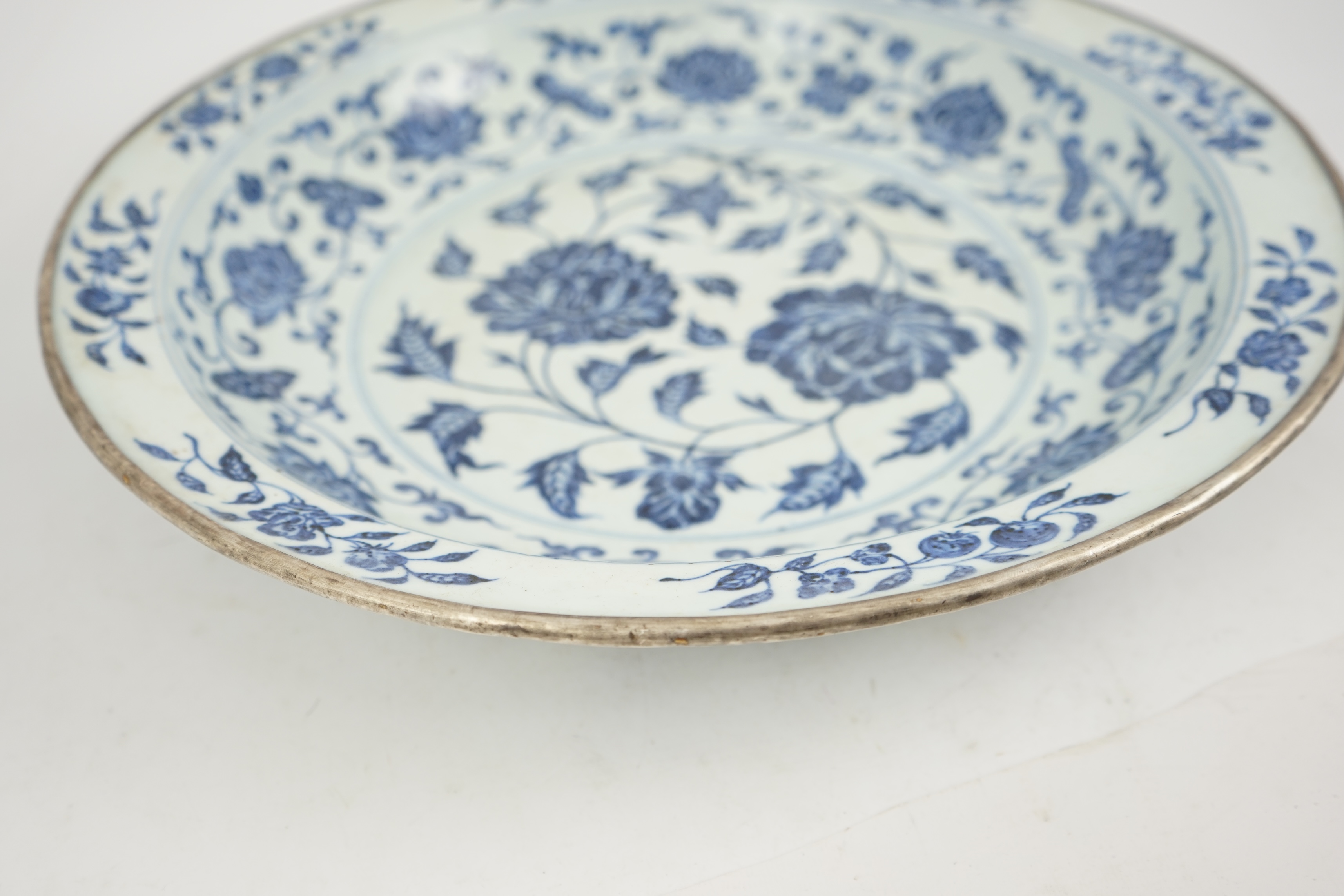 A large Chinese Ming style blue and white dish, possibly 18th century